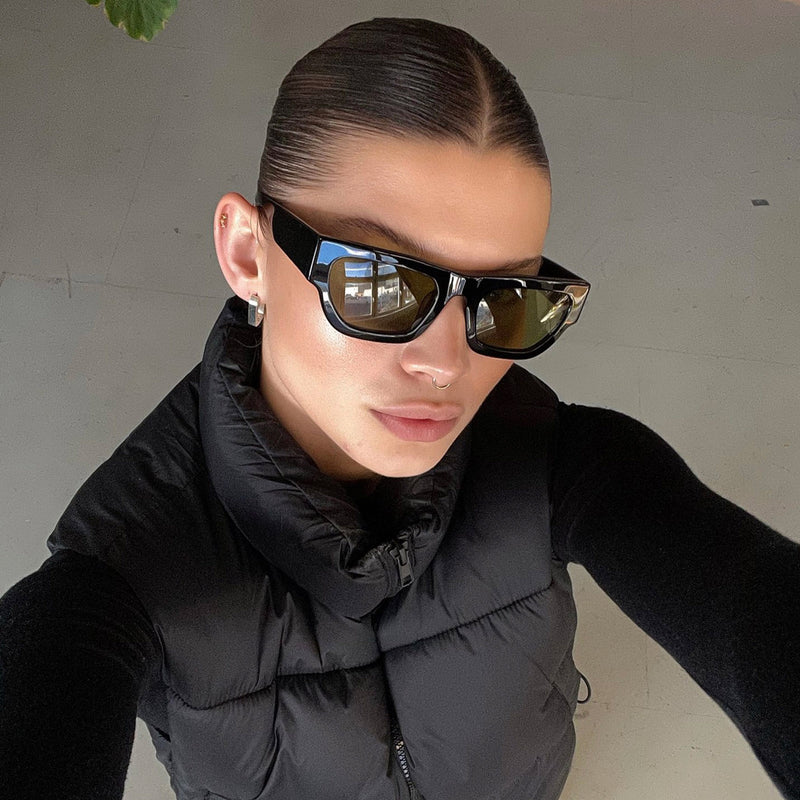 model wearing the finn sunglasses from vehla eyewear in black / khaki