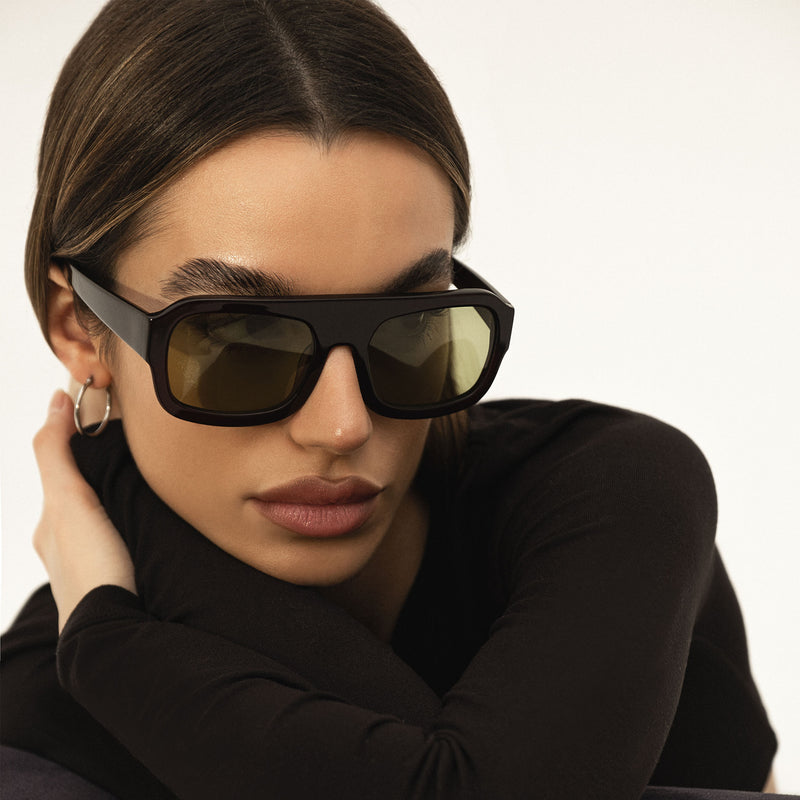 model wearing the kaia sunglasses from vehla eyewear in malbec / khaki