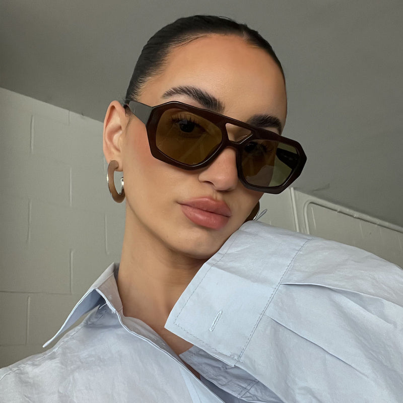 model wearing lotta river coco khaki from vehla eyewear